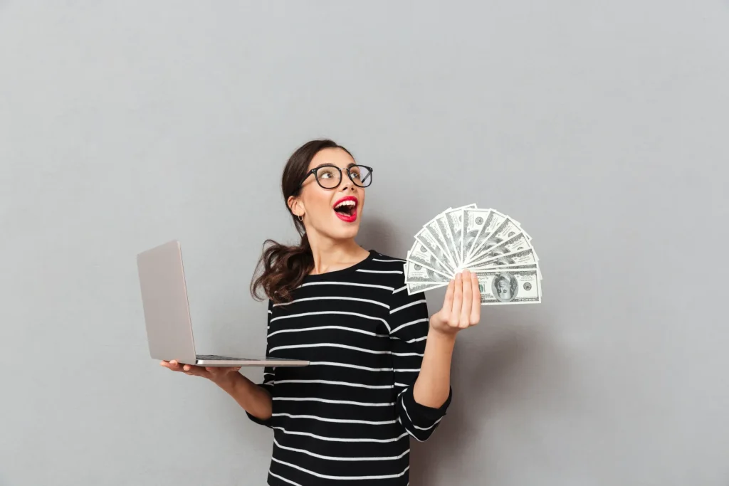 Person using laptop showing blogging income and online monetization concept