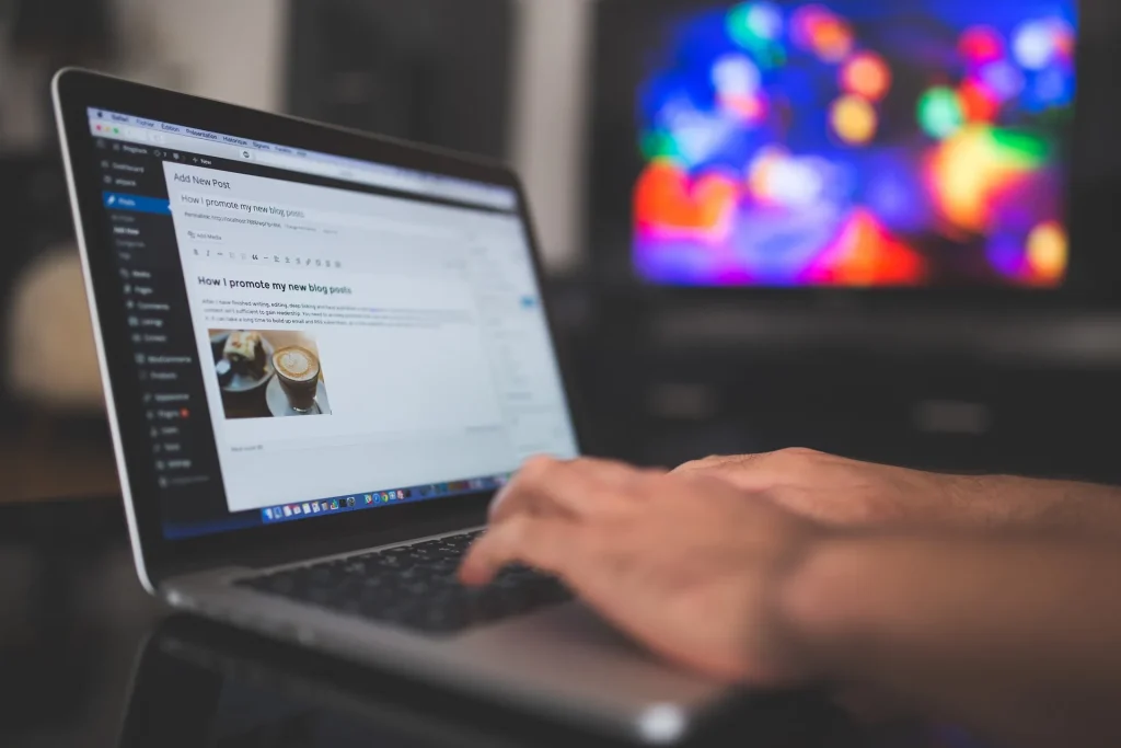 Woman working on laptop in home office building a blog and growing online income