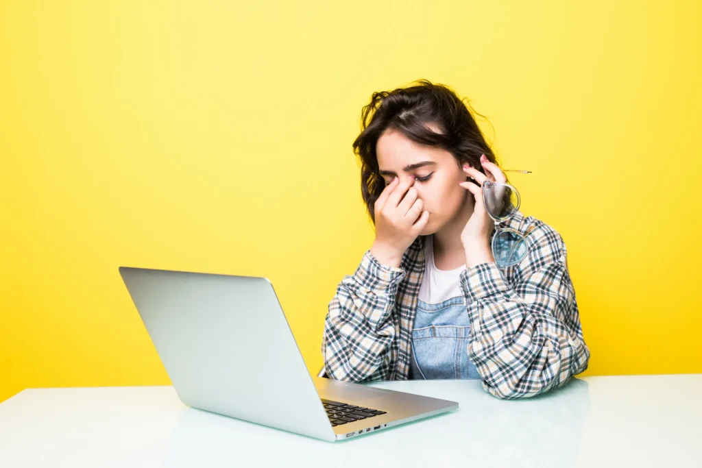 Beginner blogger frustrated with no website traffic on laptop